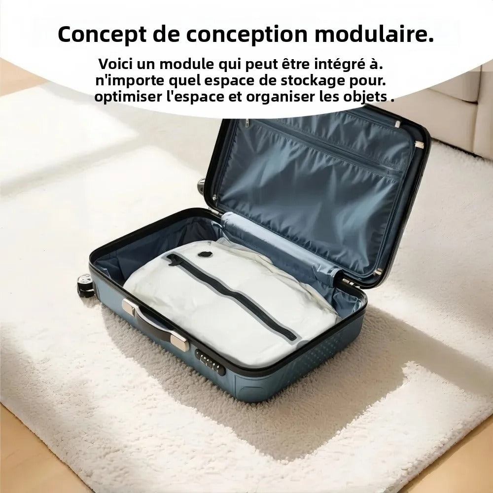 Sac compression voyage VacoPump 17L blanc avec pompe électrique à côté