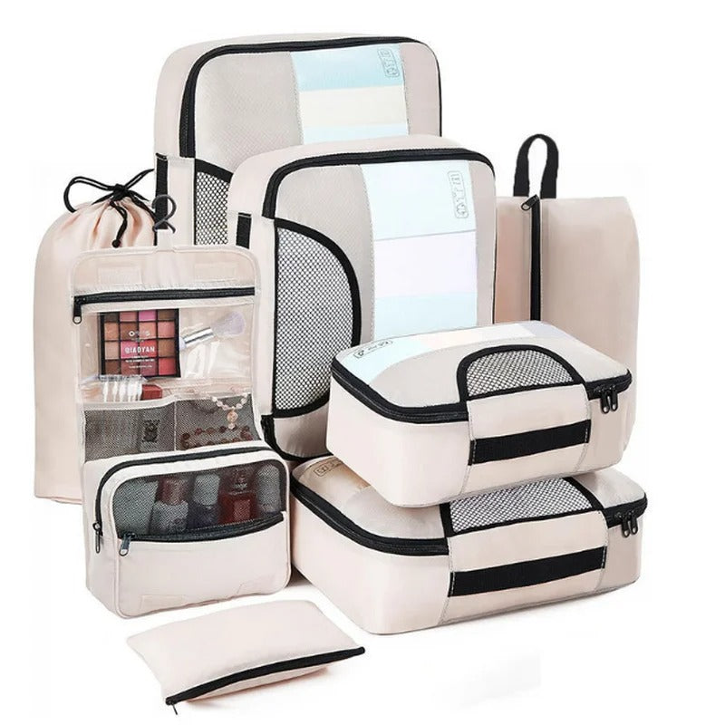 Organisateur de valise CubeFold™ 8 pièces : 4 cubes + trousse suspendue + sac linge → sac à dos. Twill durable, zip métal, mesh aéré. Valise rangée en 30s.