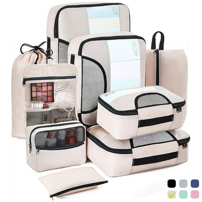 Organisateur de valise CubeFold™ 8 pièces : 4 cubes + trousse suspendue + sac linge → sac à dos. Twill durable, zip métal, mesh aéré. Valise rangée en 30s.