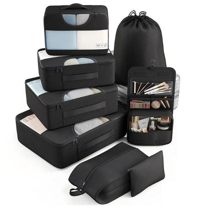 Organisateur de valise CubeFold™ 8 pièces : 4 cubes + trousse suspendue + sac linge → sac à dos. Twill durable, zip métal, mesh aéré. Valise rangée en 30s.