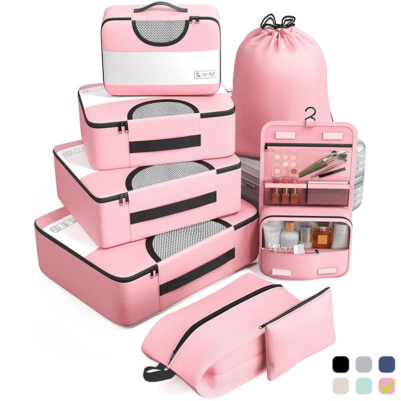 Organisateur de valise CubeFold™ 8 pièces : 4 cubes + trousse suspendue + sac linge → sac à dos. Twill durable, zip métal, mesh aéré. Valise rangée en 30s.