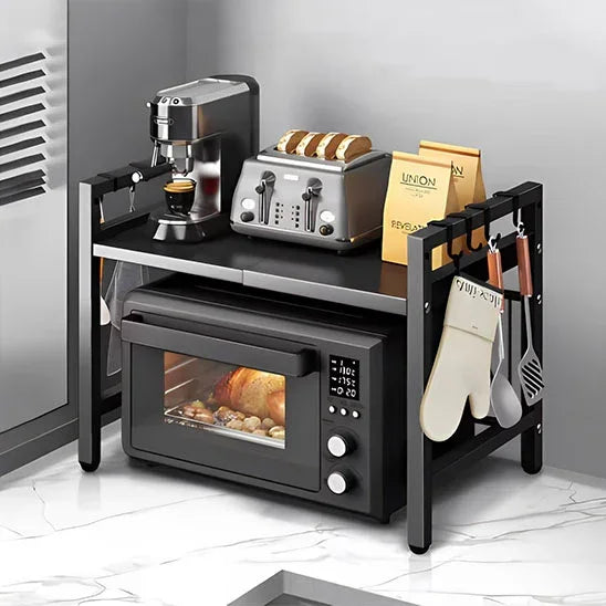 Étagère cuisine extensible SpaceRack™ noire sur un plan de travail.

Détail du réglage de la longueur de 40 à 60 cm de l'étagère.

Étagère SpaceRack™ supportant un micro-ondes et un grille-pain.

Plan de travail libéré et désencombré grâce à l'étagère extensible.

Structure en acier renforcé de l'étagère pour électroménagers lourds.

Mécanisme de réglage extensible de l'étagère de cuisine.

Design épuré de l'étagère SpaceRack™ dans une cuisine moderne.

Comparaison avant/après montrant le gain de place spec