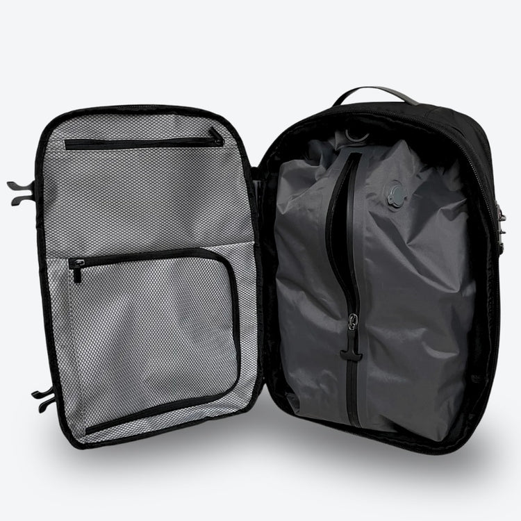 sac à dos compression sous vide Evasion Slim ouvert avec compartiments organisation voyage