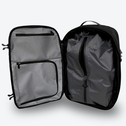 sac à dos compression sous vide Evasion Slim ouvert avec compartiments organisation voyage