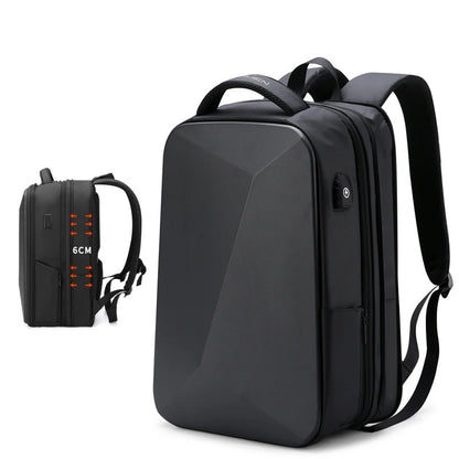 Sac-a-dos-antivol-nomad-shield, modèle Explorer Pro ouvert à 180° montrant son organisation pour ordinateur 15,6 pouces et tablette.