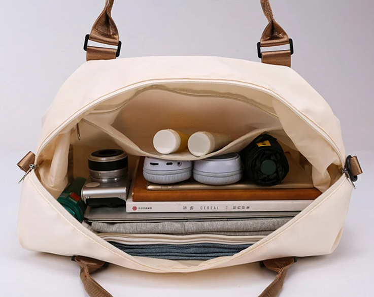 Intérieur organisé du sac de voyage cabine FlexCarry large, accessoires et rangement optimisé