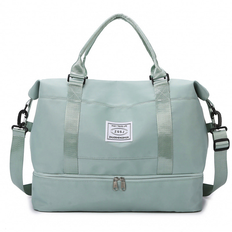 sac de voyage cabine FlexCarry vert à double compartiment, bandoulière réglable, rangement bagage
