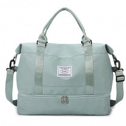 sac de voyage cabine FlexCarry vert à double compartiment, bandoulière réglable, rangement bagage