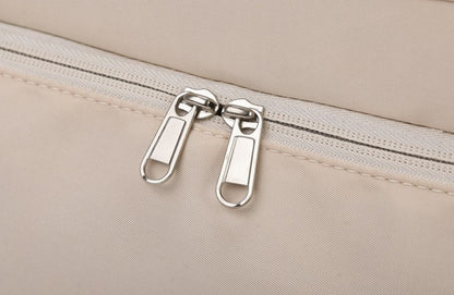 Zoom sur la fermeture éclair du sac de voyage cabine FlexCarry, détail haute qualité