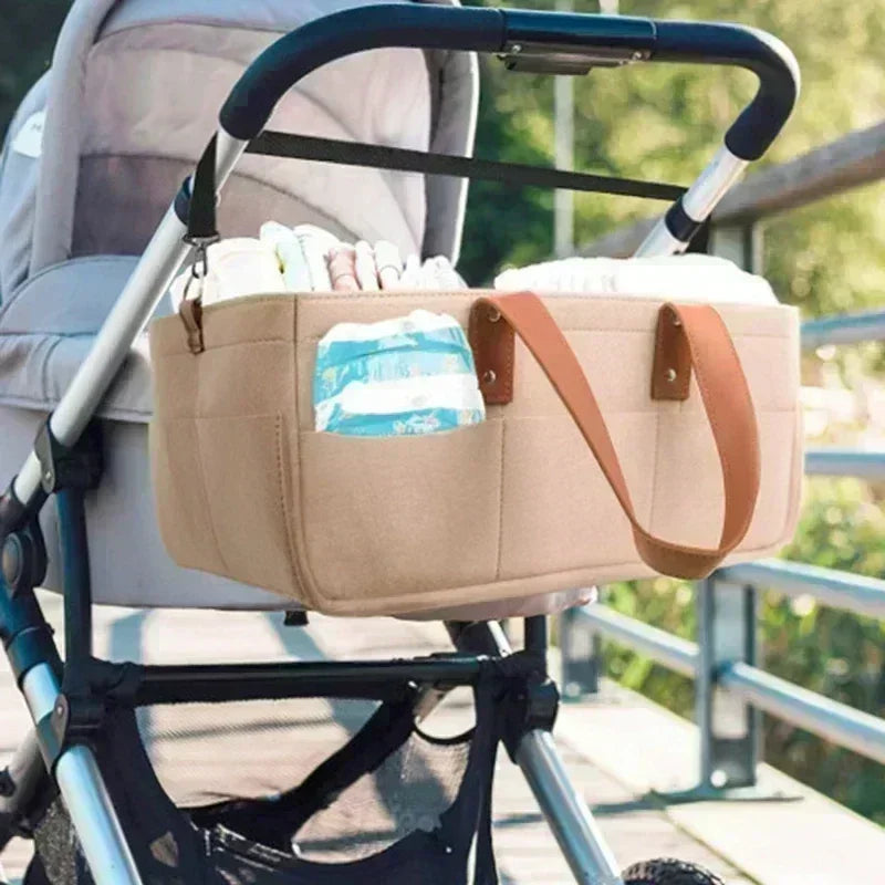 organisateur de poussette universel, sac de rangement pour poussette bébé, organisateur de poussette grande capacité, panier de rangement pliable pour poussette, sac suspendu pour poussette de voyage, organisateur de poussette en feutre élégant, rangement poussette pour couches et biberons, sac de poussette multifonction avec poches, organisateur de poussette portable avec poignées, rangement pratique pour accessoires de bébé, organisateur de poussette pour maman active, sac de rangement suspendu pour pouss